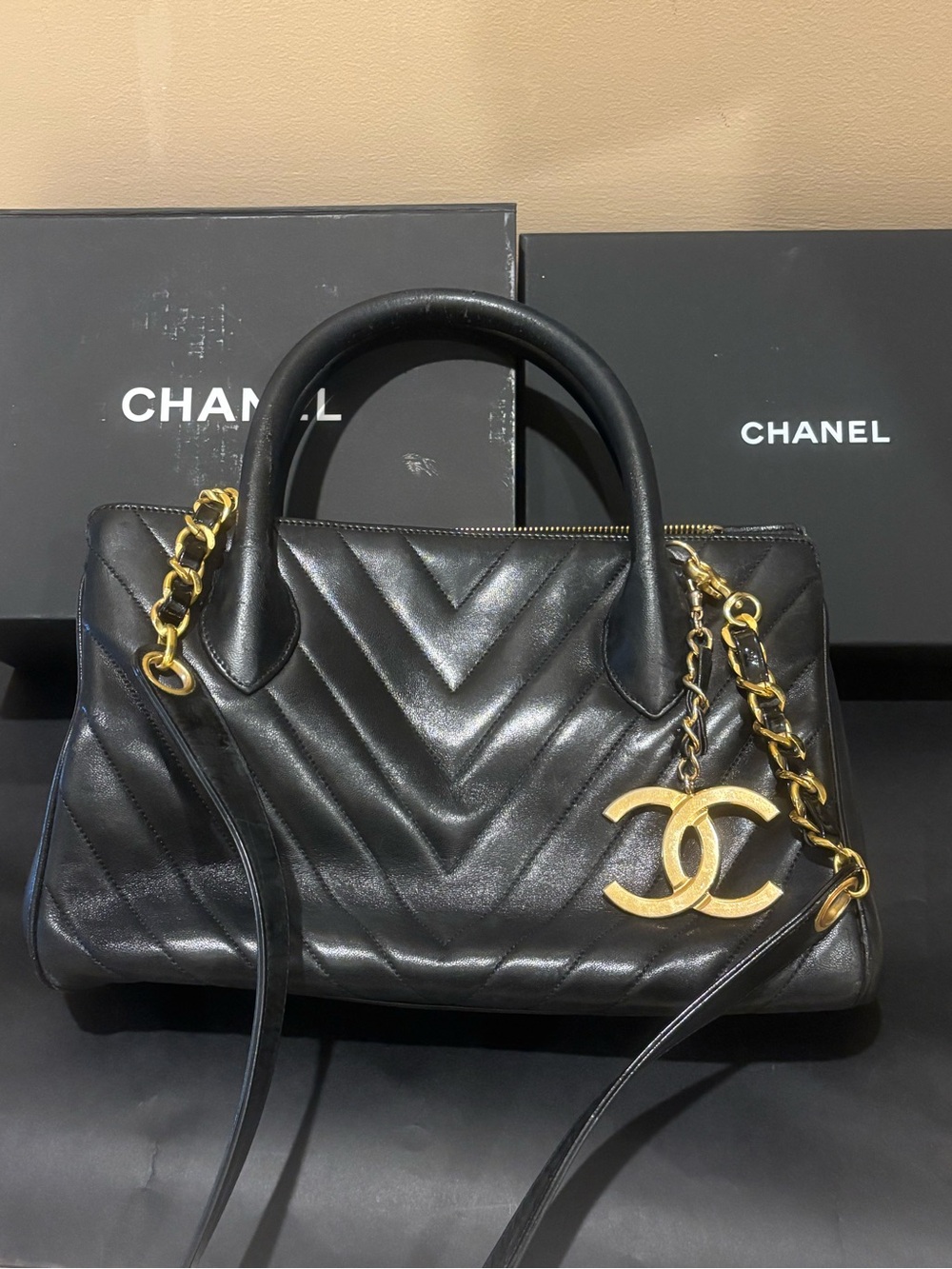 CHANEL Black Chevron Quilted Leather Shoulder Bag with Gold CC Charm
